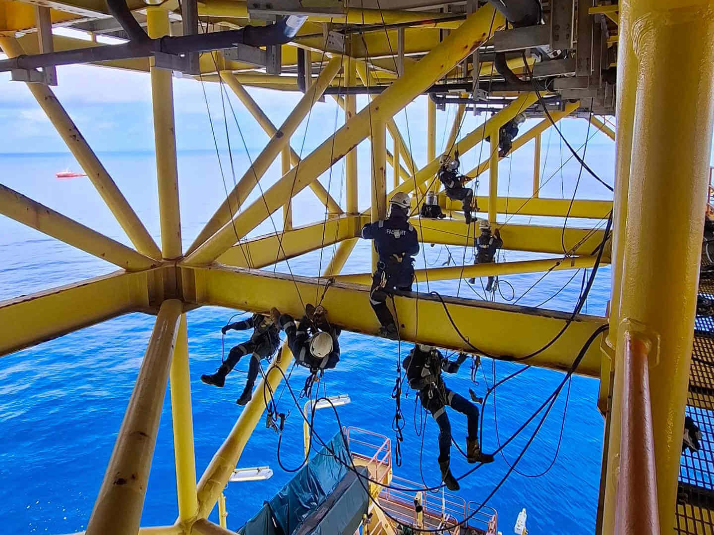 Blasting and painting operations on offshore structure